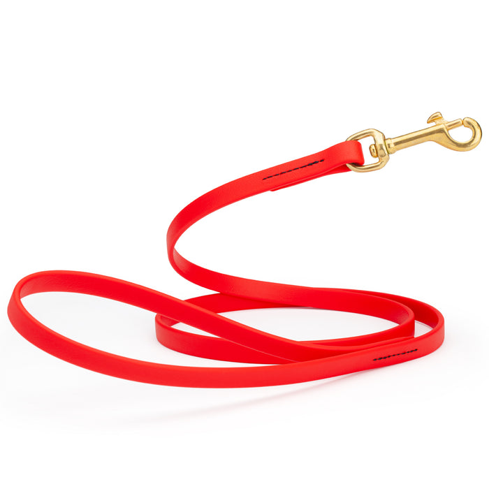 Cherry red dog leash with brass snap hook, made from waterproof Biothane, 1/2 inches wide
