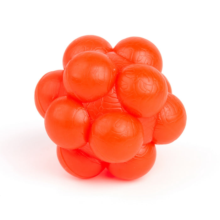 Red rubber bumpy ball dog toy for chewers with vanilla scent