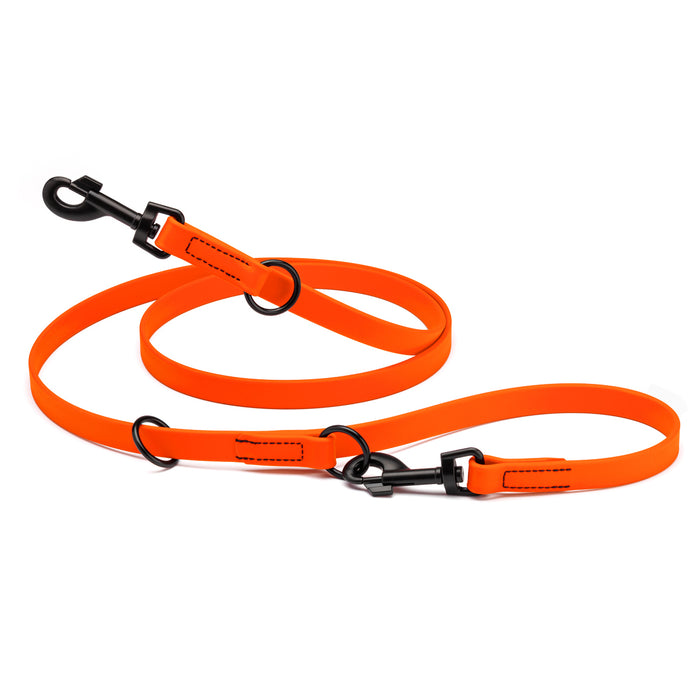 Hunter orange adjustable dog leash with two metal clips and three O-rings, made from waterproof Biothane