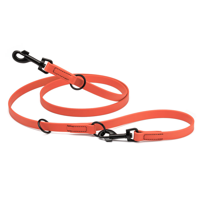 Coral adjustable dog leash with two metal clips and three O-rings, made from waterproof Biothane