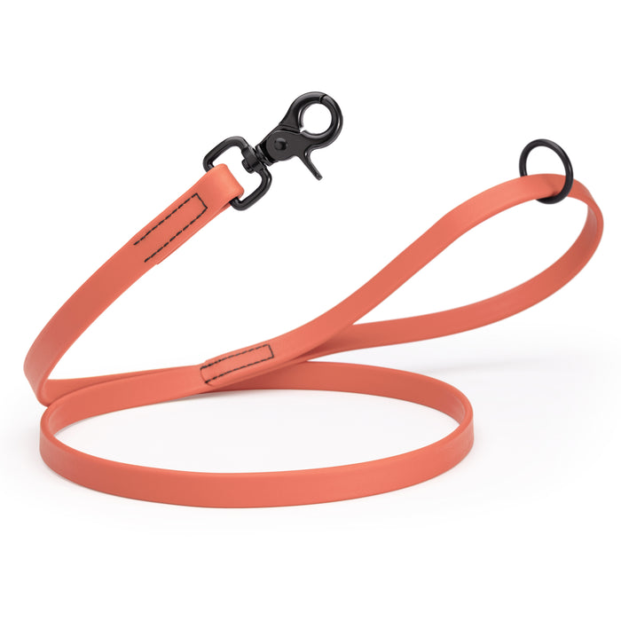 Coral dog leash with black clasp and O-ring, made from waterproof Biothane, 3/4 inch wide