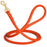 Orange leather dog leash with solid brass snap hook, 1/2 inch wide, rolled