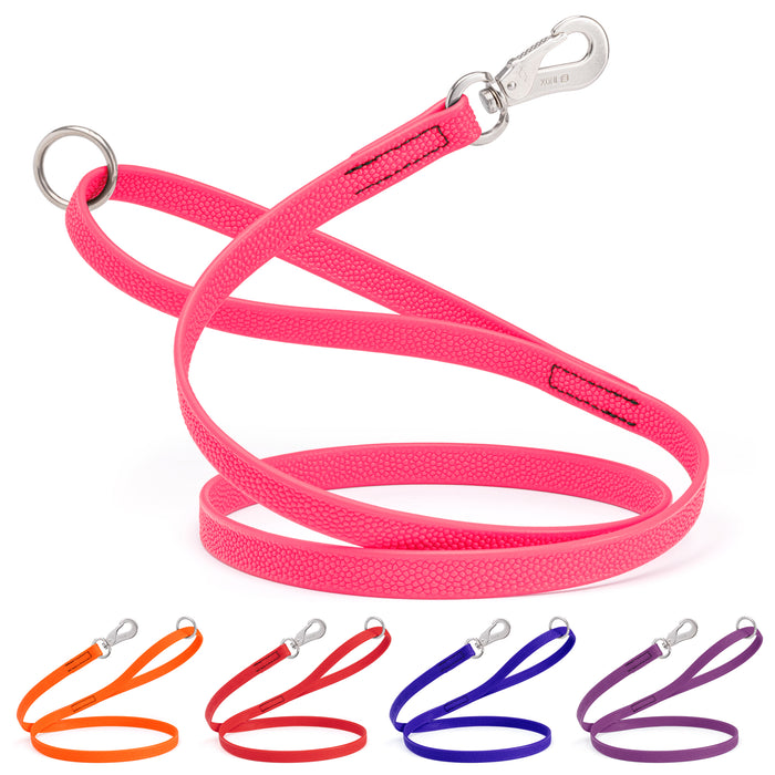 Pebble Biothane dog leashes with Sprenger hook and handle O-ring; pink, orange, red, blue, purple, and other color options available. 